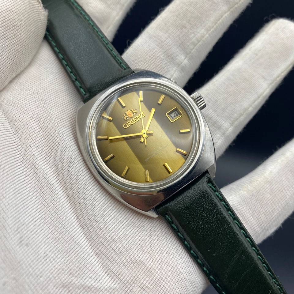 Reloj para hombre Orient años 60 NOS ojo de tigre esfera de piedra cuerda manual muy raro y de colección Foto 4 de 4