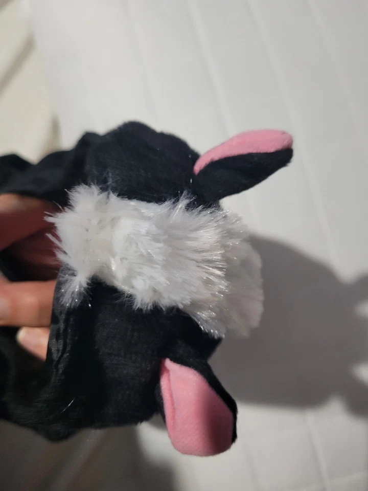 Disfraz de perro Lil' Stinker, pequeño (se adapta a longitudes de hasta 12"), negro/blanco Foto 3 de 4