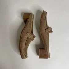 Brown leather mules with reptile print and buckle , 2” heel. Size: 8.5 Brand: S