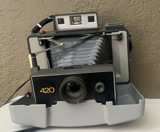 VINTAGE POLAROID 420 AUTOMATIC LAND CAMERA W/CASE/MANUAL/MISC-UNGETESTET