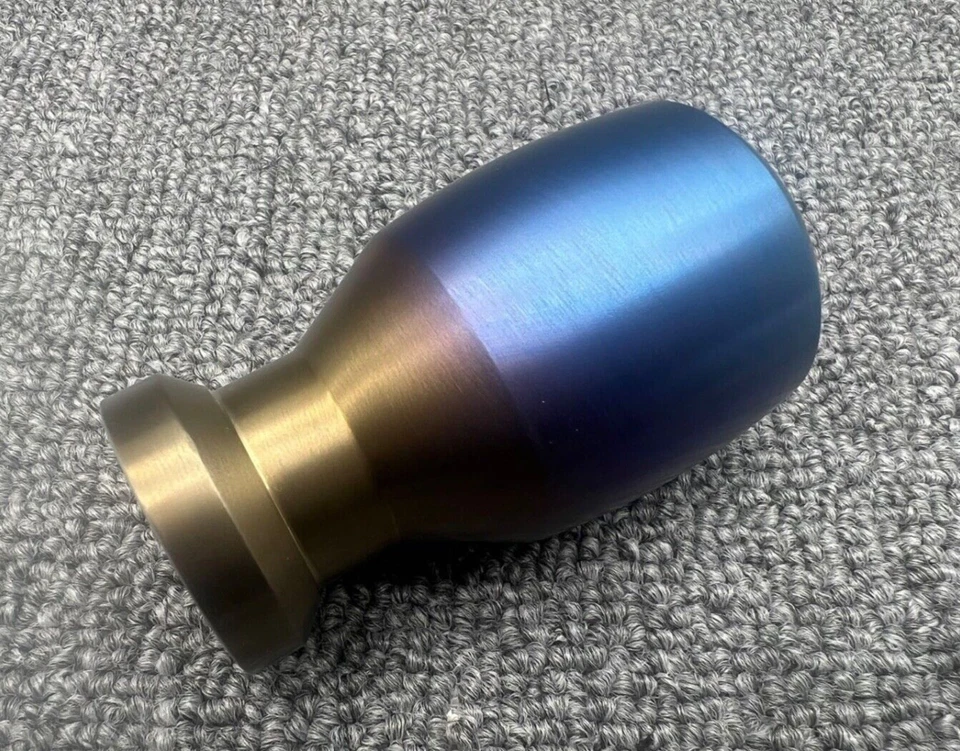 Cuchara deportiva estilo titanio forma ovalada aluminio perilla de cambio de marchas ponderada Foto 3 de 4