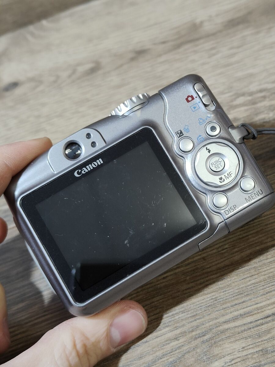 Canon PowerShot A710 IS 7.1 MP Compact Digital Camera Silver Canon PowerShot A710 IS 7.1 MP Compact Digital Camera Silver
