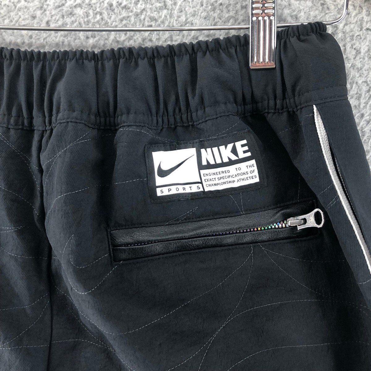Nike Woven Tearaway Pants 'New Age of Sports' Black/White Nike Woven Tearaway Pants 'New Age of Sports' Black/White