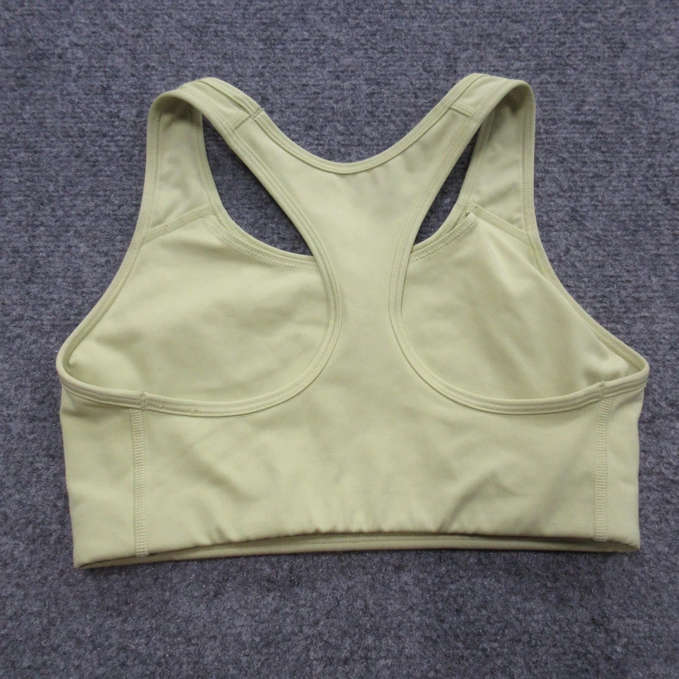 Sujetador deportivo Nike Dri-FIT medio amarillo espalda deportiva entrenamiento gimnasio yoga Foto 3 de 4