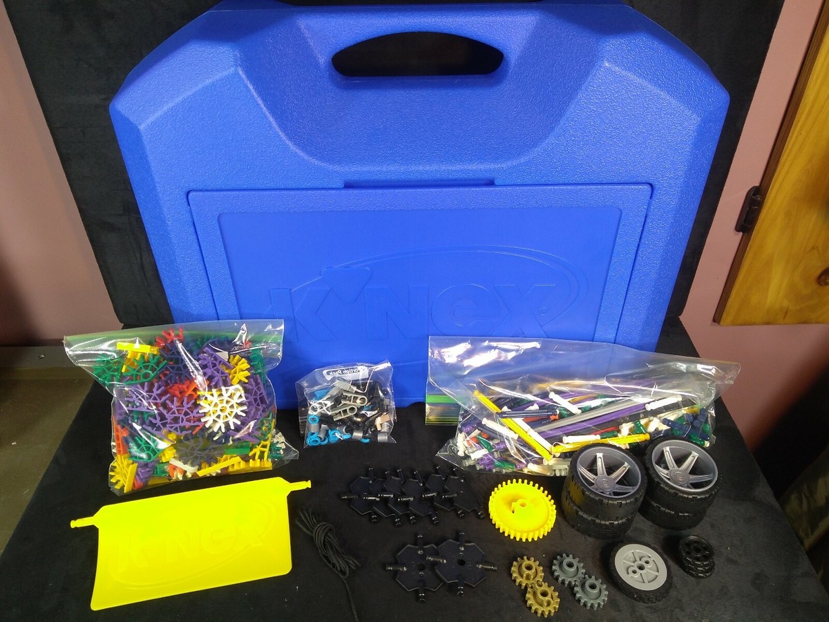 Lot of K'nex Pieces In Large Blue Storage Bin with Tires, Plow