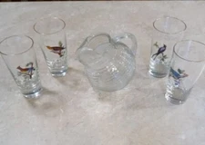 Slanted pitcher and 4 glasses
