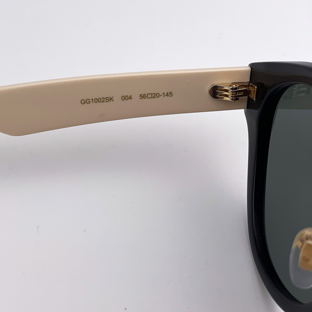 Gucci Women Sunglasses Black White Grey Round LOGO GG1002SK  display picture 1