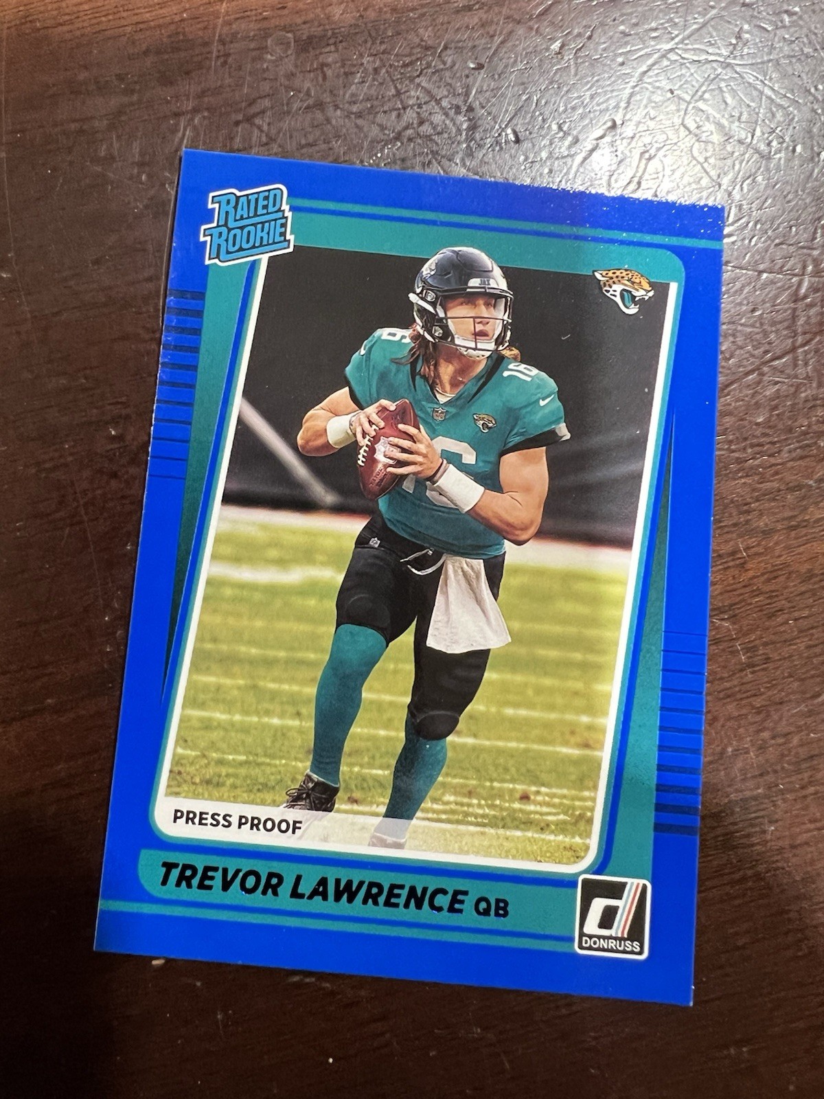 2021 Donruss Trevor Lawrence Press Proof Blue Rookie Rated Rookie #251