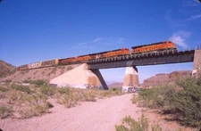 BNSF 7062 ES44C4 AUTORACKS KINGMAN CANYON AZ ORIGINAL SLIDE 06-05-22 T5-11