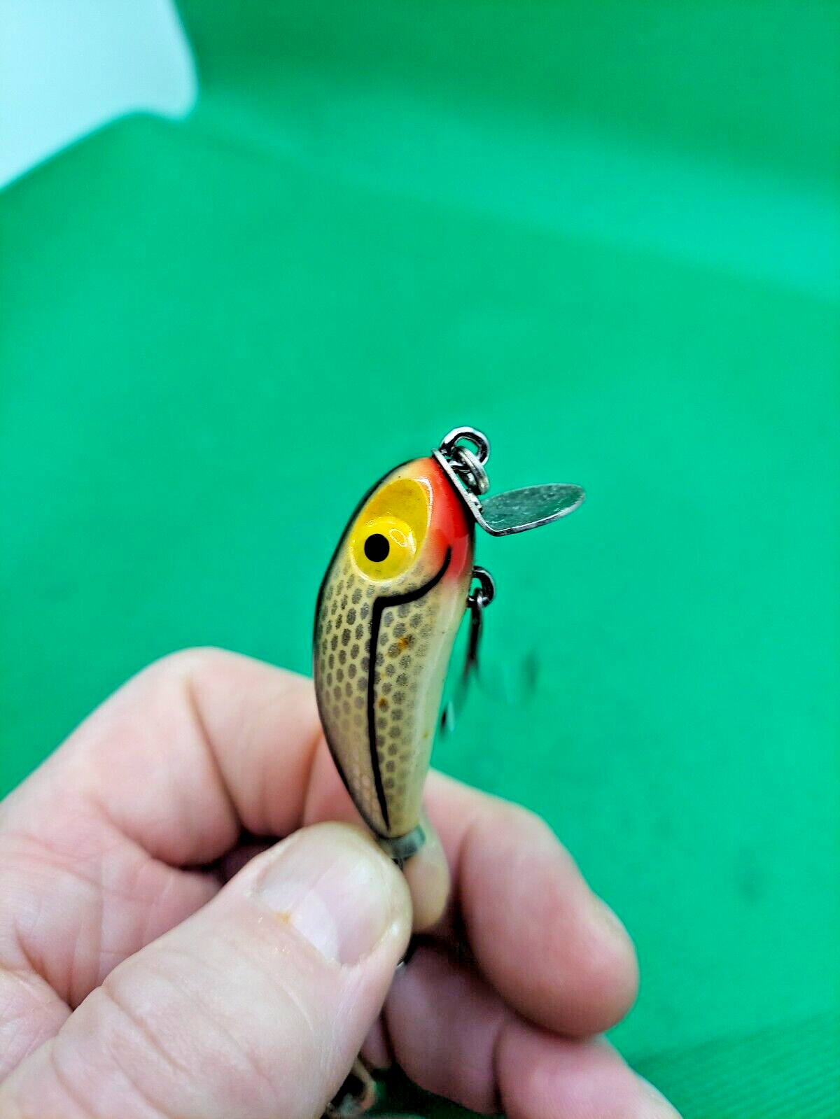 Vintage fishing lure Miracle minnow multi-colored.