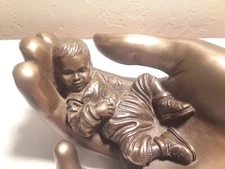 Genesis Caring Baby Boy Cold Cast Bronze Hand E/5000 made in Ireland