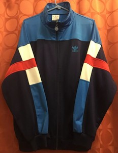 navy blue and red adidas jacket