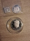 Fractional, silver 11 grams .999  and 1993 proof ken. half