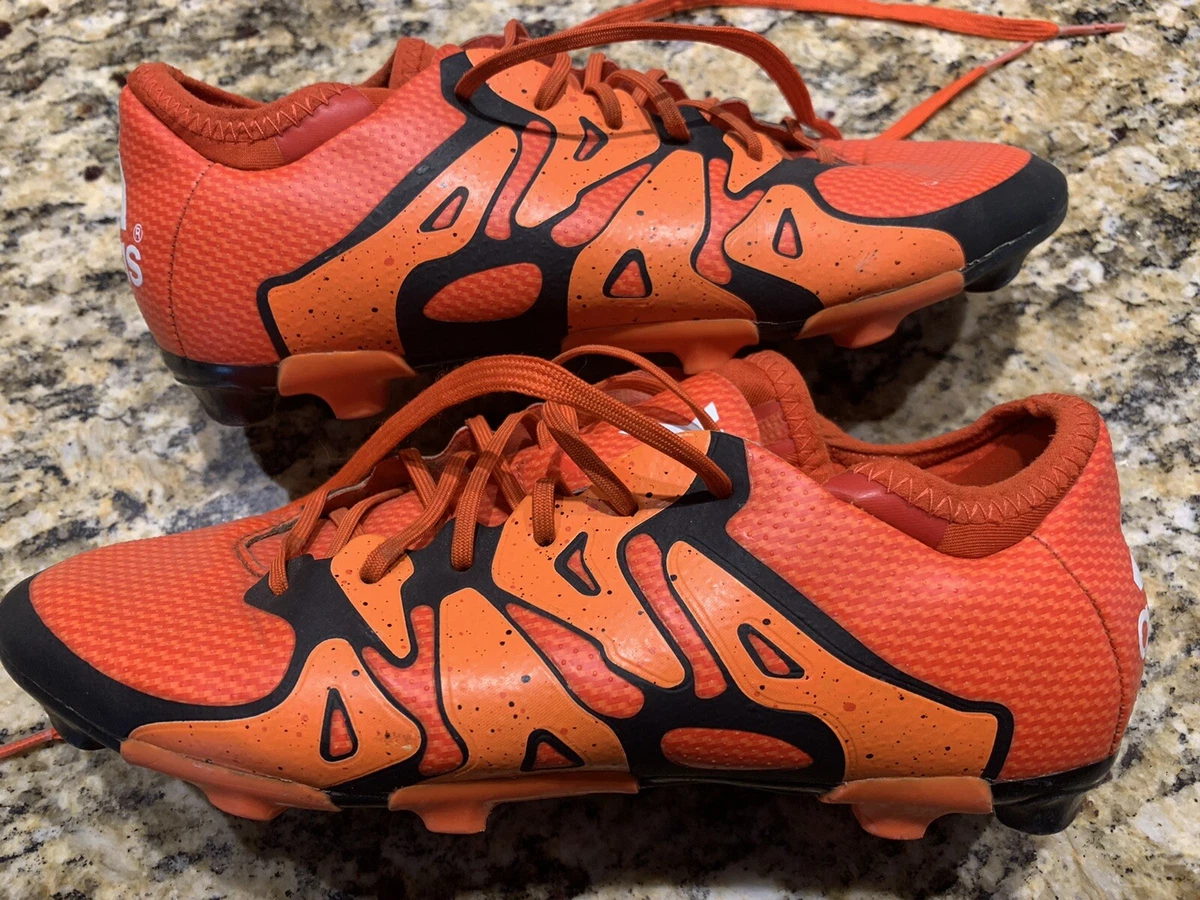Orange shop youth cleats