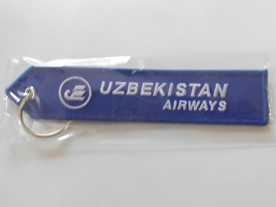 UZBEKISTAN AIRWAYS SCHLÜSSELANHÄNGER REMOVE BEFORE FLIGHT BLAU