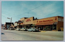 Oscoda MI Michigan 1950s Era Street View Postcard Ben Franklin Rexall Drugs O14