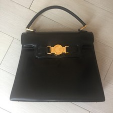 Borsa GUCCI vintage in pelle colore nero con fibbia dorata con logo