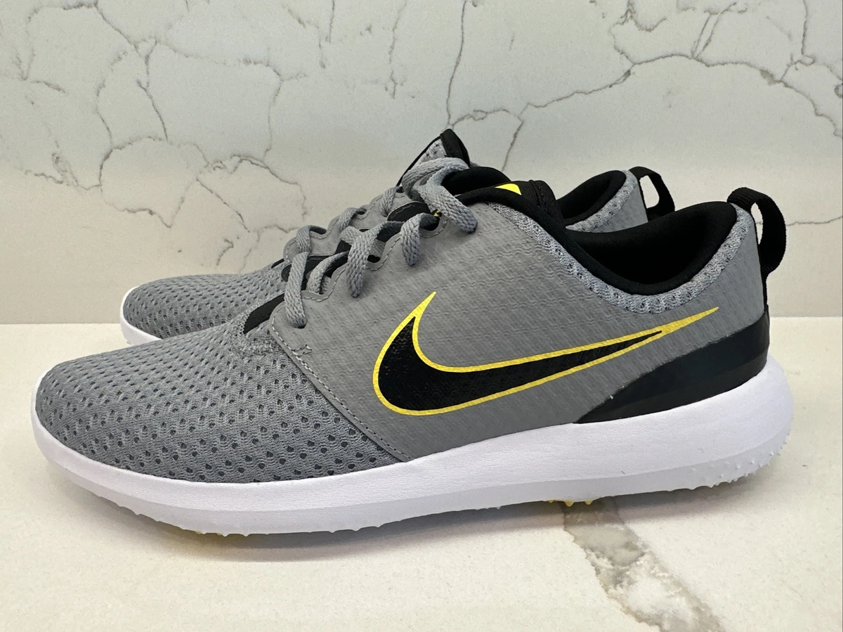 nike roshe black and yellow