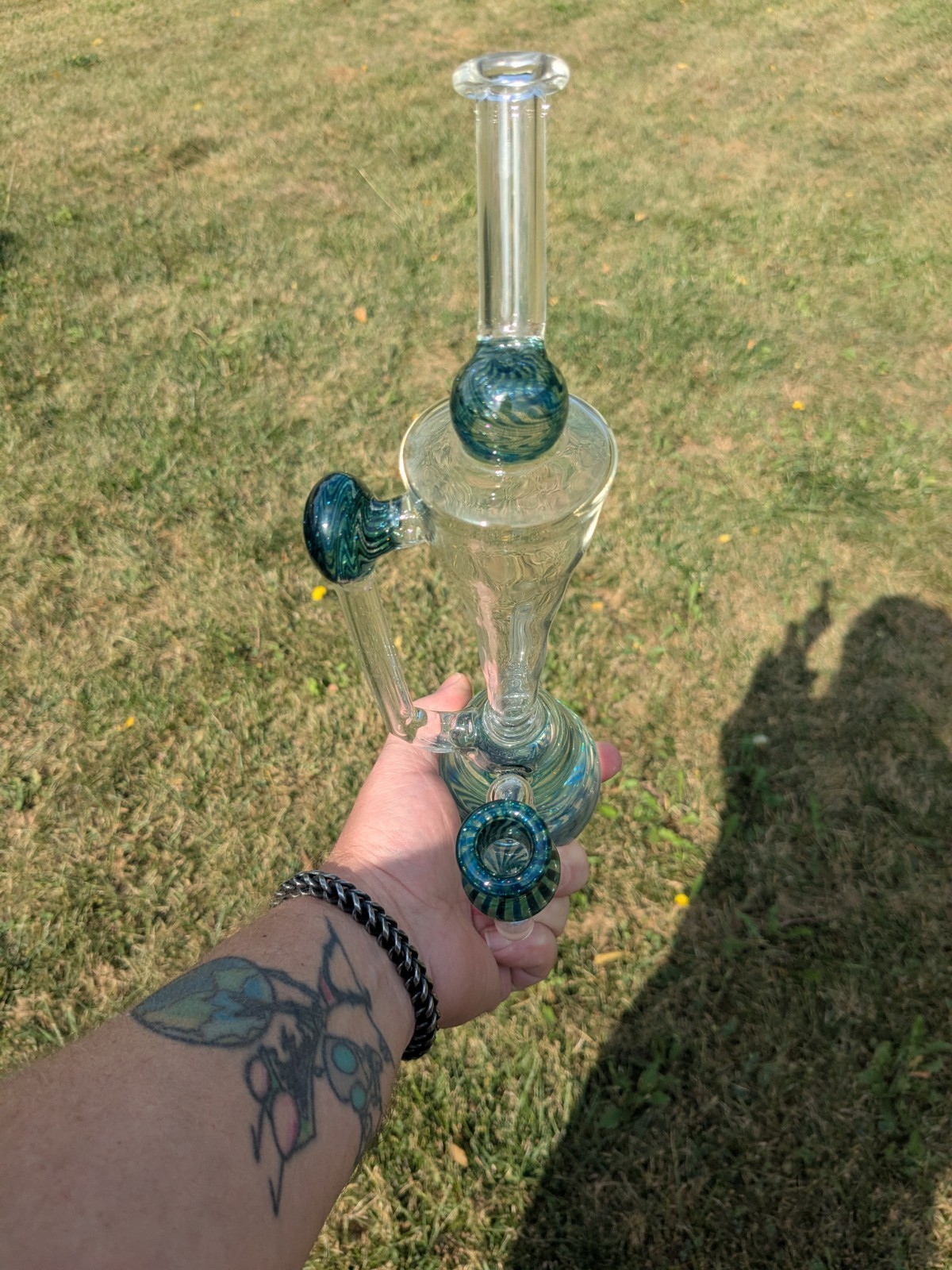 Glass Rig Klein with green sparkly wig wag 