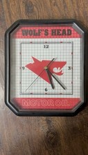 Vintage WOLF'S HEAD MOTOR OIL ADVERTISING SIGN ELECTRIC BATTERY CLOCK 10.5 x 9"