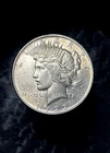 1922 High Grade About Uncirculated SILVER Peace Dollar-Lightly Toned