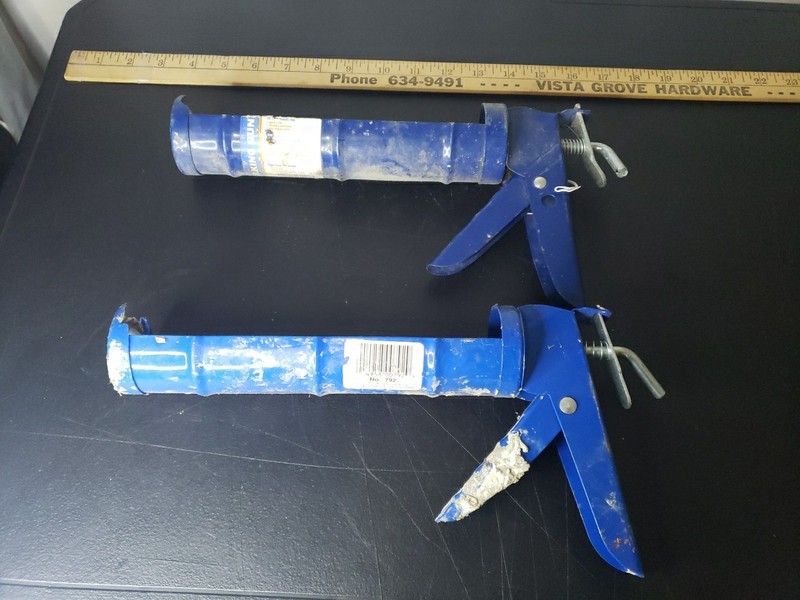 Blue Steel Caulk Guns Featuring a Smooth Rod, Ladder Hook, and Spout Cutter