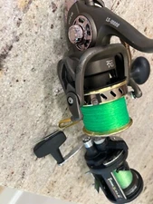 fishing reels 1 is penn gls 25 the other is a Dr. Fish lbs-10000