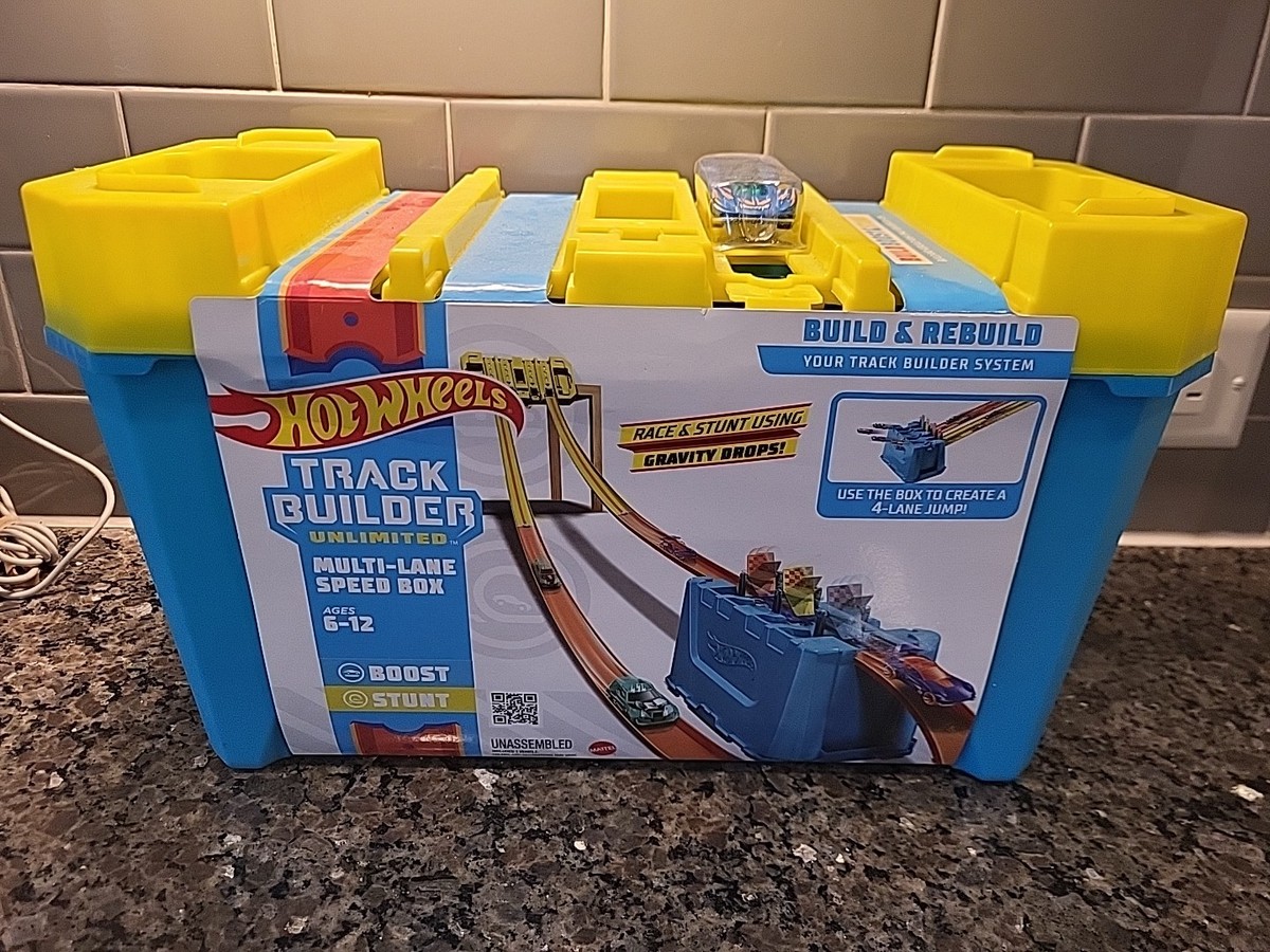 hot wheels track builder unlimited power boost box track set Hot Wheels Track Builder Unlimited Power Boost Box Playset – Square Imports main image 0