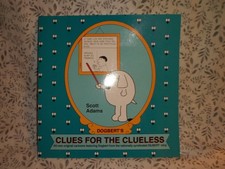 Lot 9a - Clues For The Clueless by Scott Adam...