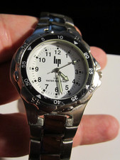 LIP SPORTS WATCH - WHITE DIAL STAINLESS STEEL LADIES' RUNS GREAT FITS 7" - OFC-R