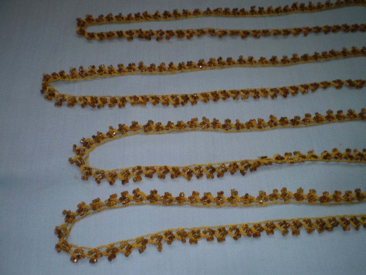 Antique hand embroidered glass beads on ribbon