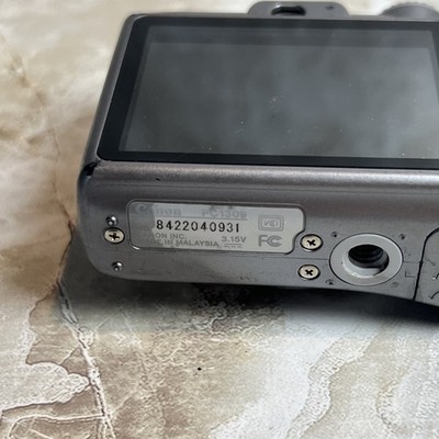 Canon PowerShot A1000IS Pocket Digital Camera PC1309 FOR PARTS or