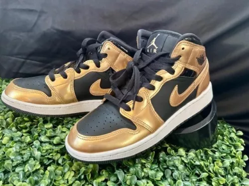 Air Jordan 1 Mid SE Black and Metallic Gold Shoes.  US size 5Y.  Worn once