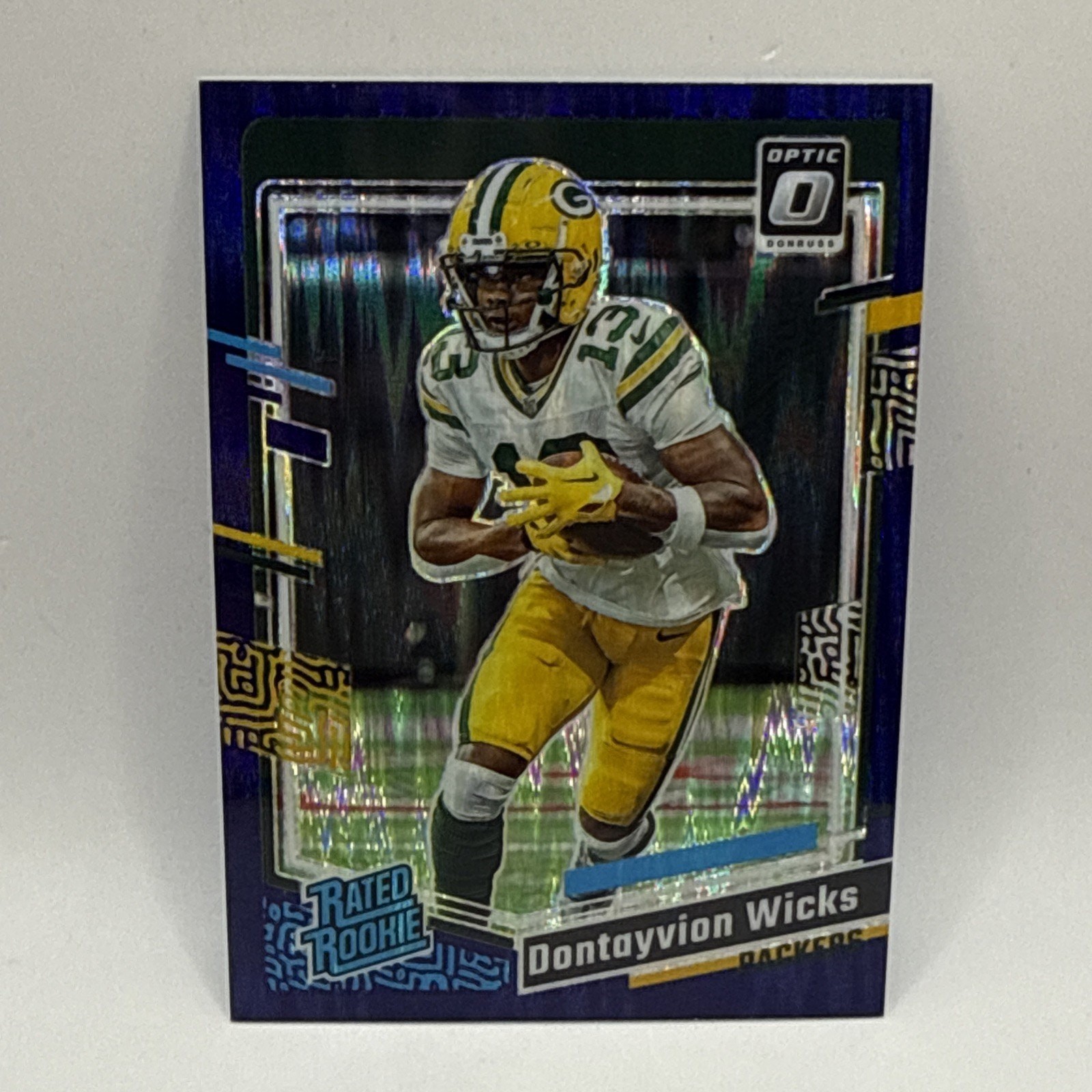 2023 Optic Purple Shock Rated Rookie Packers Dontayvion Wicks #249