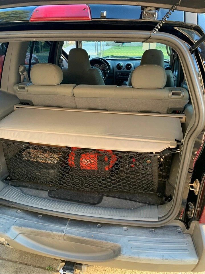 Red de carga organizadora de malla estilo sobre maletero trasero para Jeep Liberty 2002-2007 Foto 2 de 4