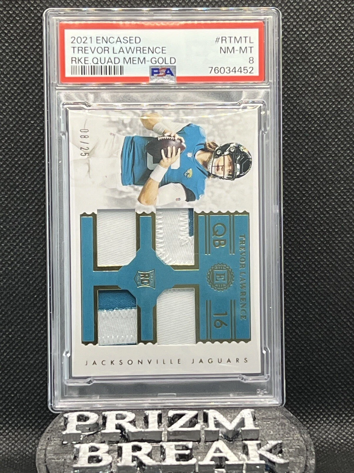 Trevor Lawrence Panini Encased Rookie Quad Memorabilia #RTMTL Gold