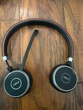Jabra Evolve 65 Wireless Dual-Ear Headphones Headset and Charging Stand.