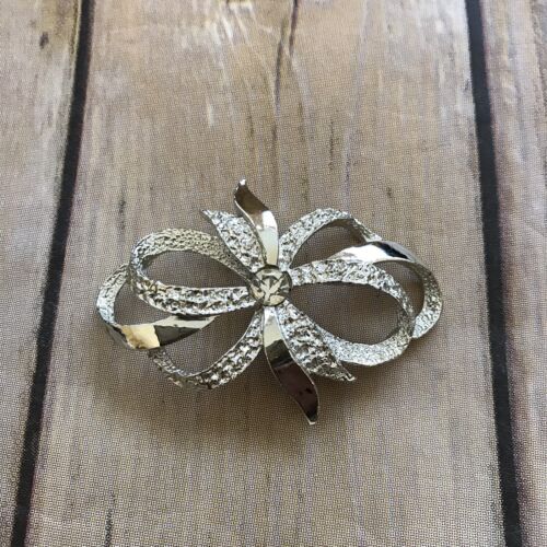 Broche prendedor cinta arco Gerry’s con estrás