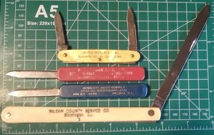 Mixed lot of vintage advertising knives 4 knives