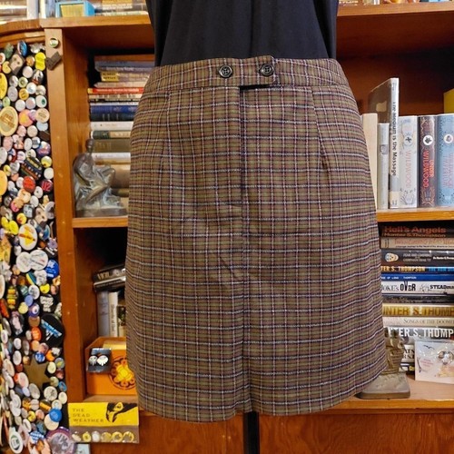 Vintage plaid long mini skirt with button detail.