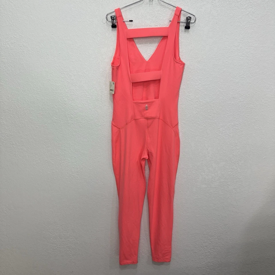 NUEVO CON ETIQUETAS $98 Mono de una pieza Free People Movement Never Better en coral neón talla M Foto 4 de 4