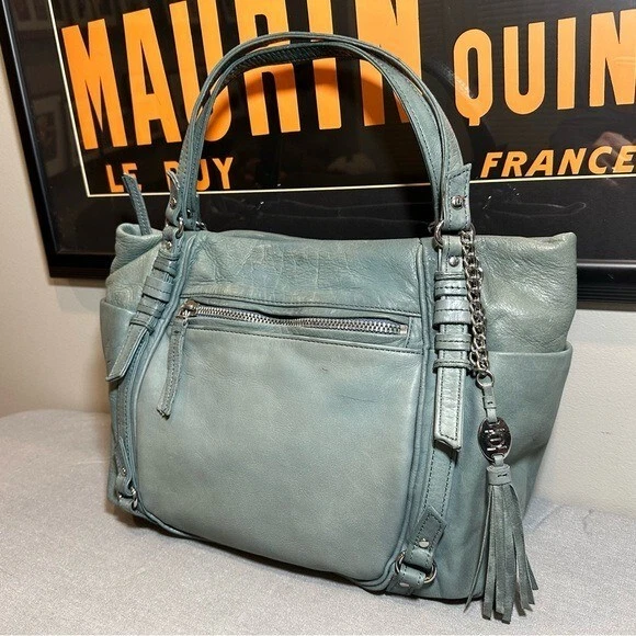 Cartera hobo Olivia Harris de cuero con cremallera con borla Foto 2 de 4