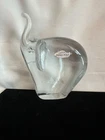 Blenko Glass 76E Elephant Paperweight is a vintage hand-blown piece designed by