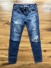 American Eagle Women  s Distressed Jegging Medium Wash Faded, Size 4 27.5  inseam