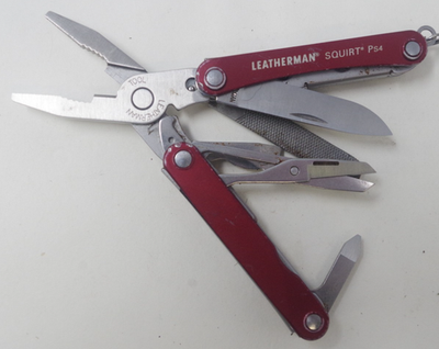 Retired Red Supreme Leatherman Squirt PS4 Multi-Tool Pocket Knife