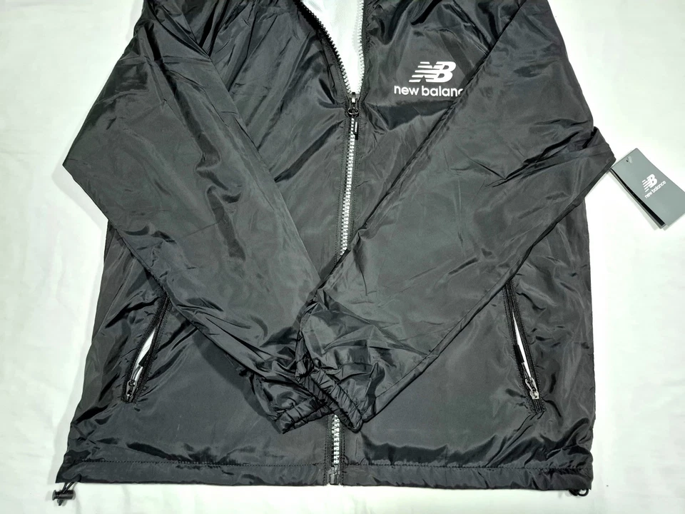 Chaqueta cortavientos New Balance para hombre totalmente forrada ligera con capucha talla grande Foto 2 de 4
