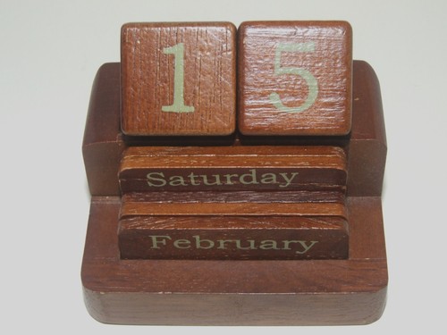 A Small Marks & Spencer Wooden Desk Calendar