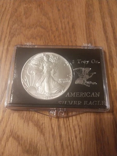 1987 AMERICAN SILVER EAGLE UNCIRCULATED 1 TROY OUNCE .999 FINE LIBERTY