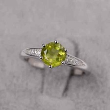 peridot ring round cut green gemstone August birthstone sterling silver ring
