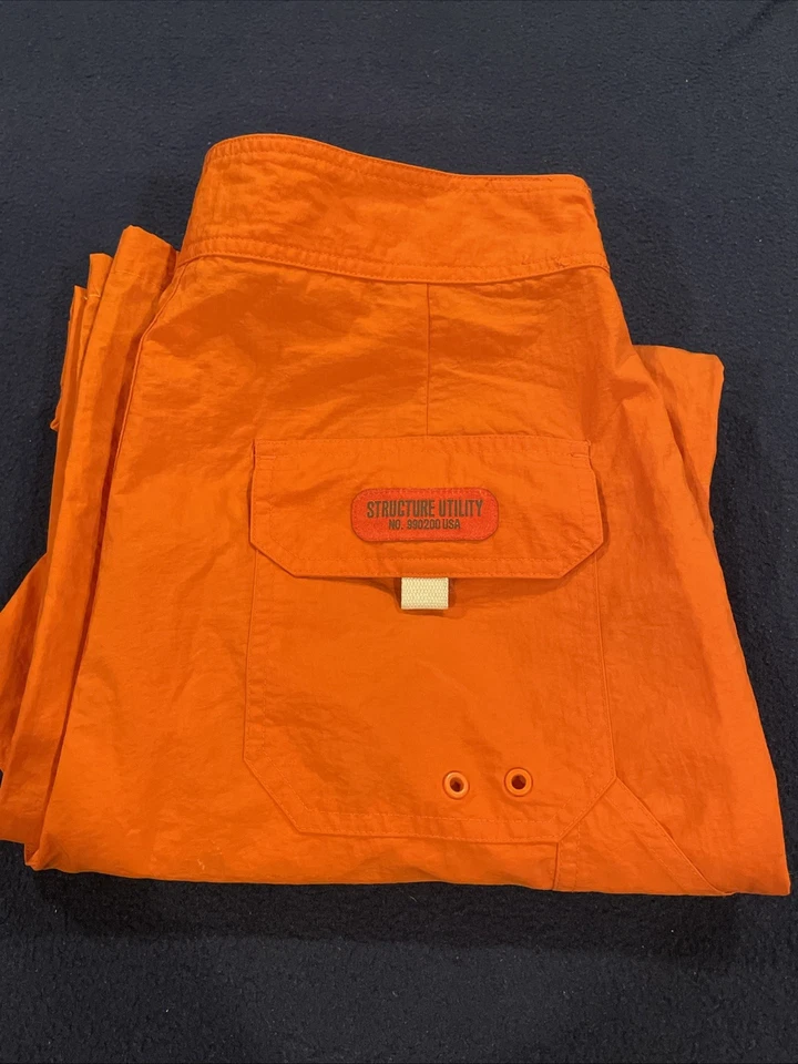 Структура совершенно унисекс трековые брюки с молнией до шорт особенность оранжевый размер средний - Изображение 3 из 4